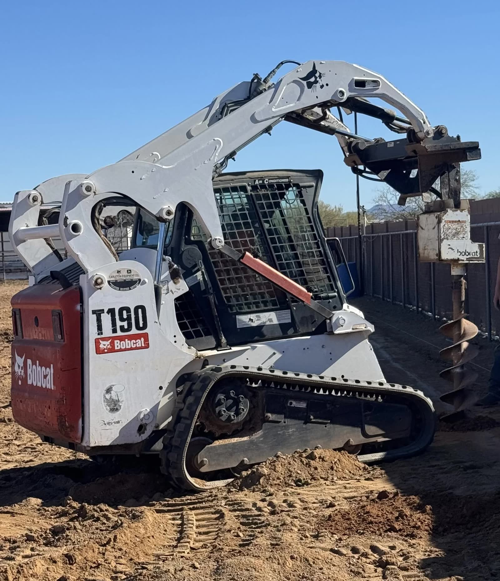 Bobcat loader working on a prepared site