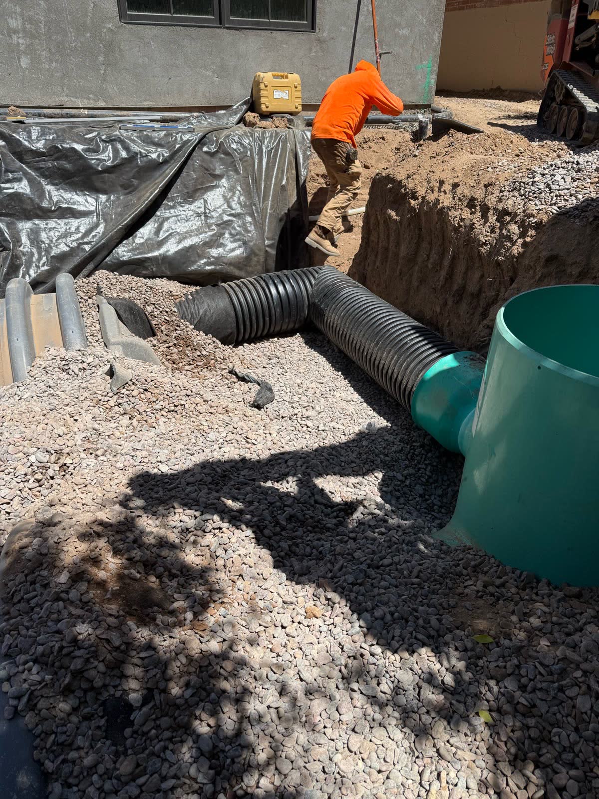 Corrugated septic chamber field with green access riser