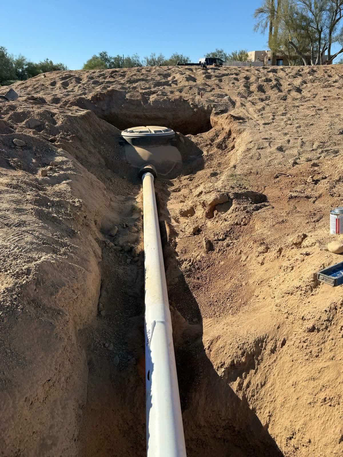 Septic tank and excavation for a residential system